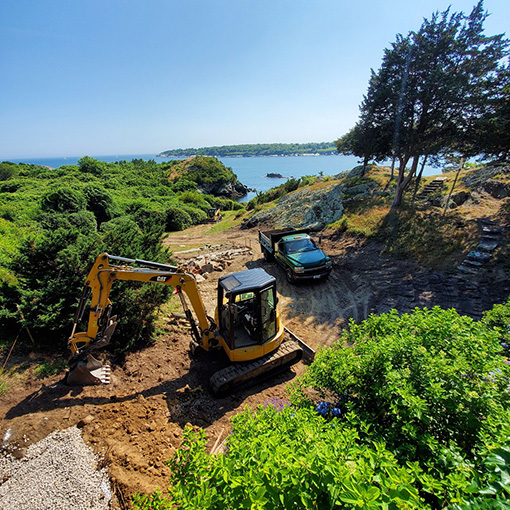 Compact excavating equipment on residential property